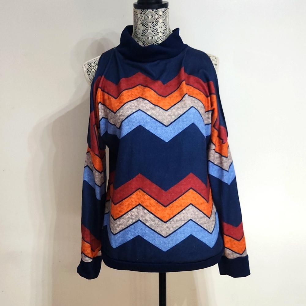 Vintage-y cold shoulder sweater